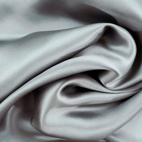 A close-up image of a Pillowtex 100% Mulberry Silk Pillowcase, perfect for skin care and hair care.